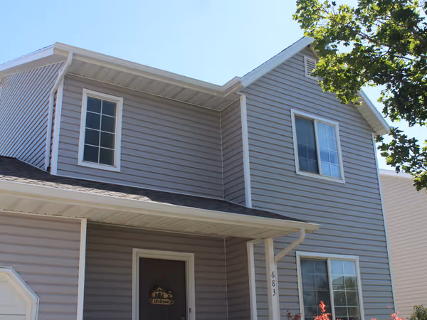 Gray Lap Siding And Covered Porch