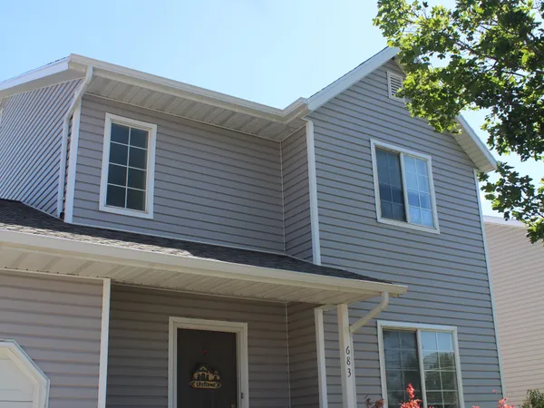Gray Lap Siding And Covered Porch