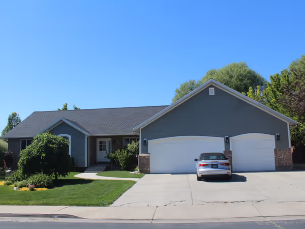 Gray Rambler Roof And Siding